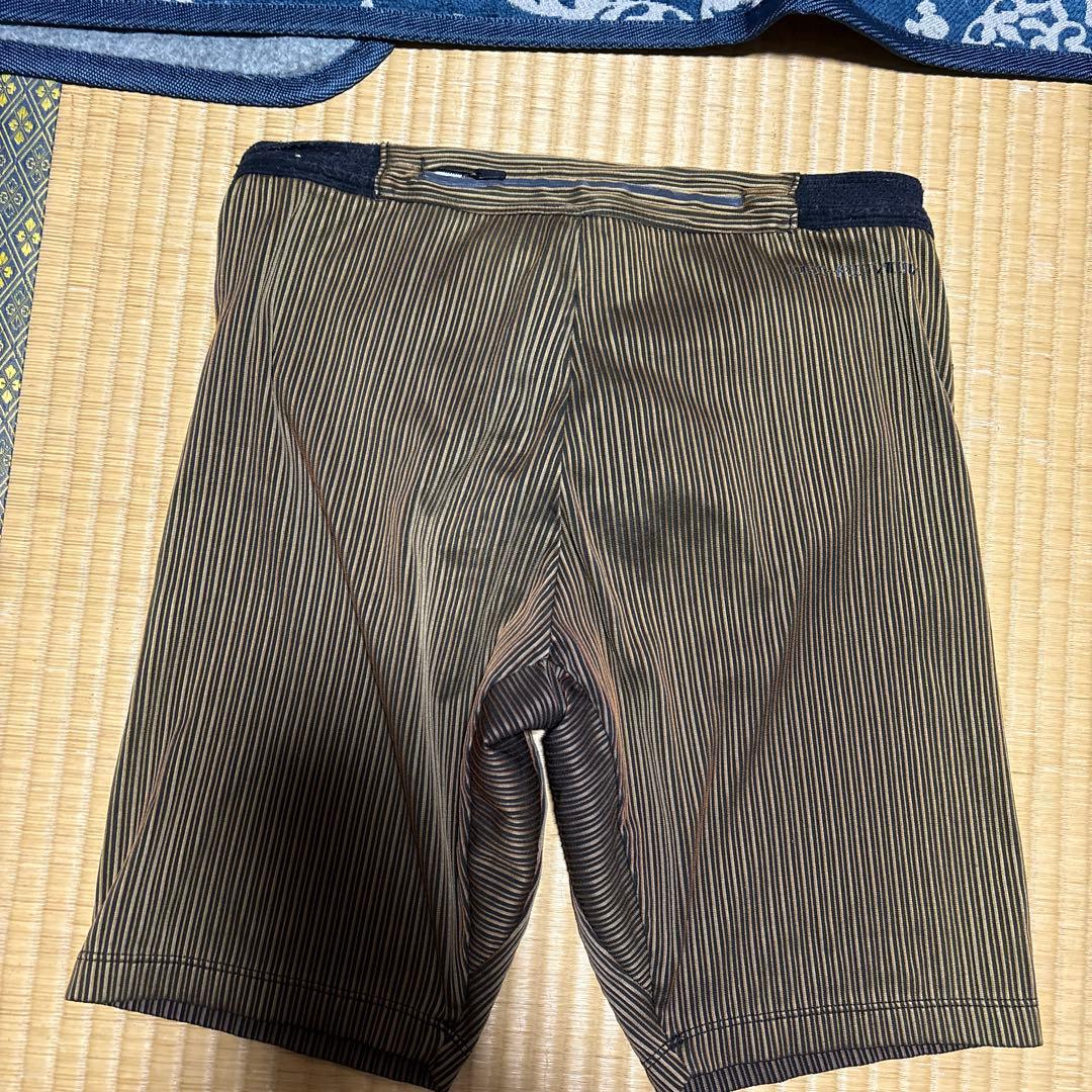 Nike 蛍光イエロー タンクトップ