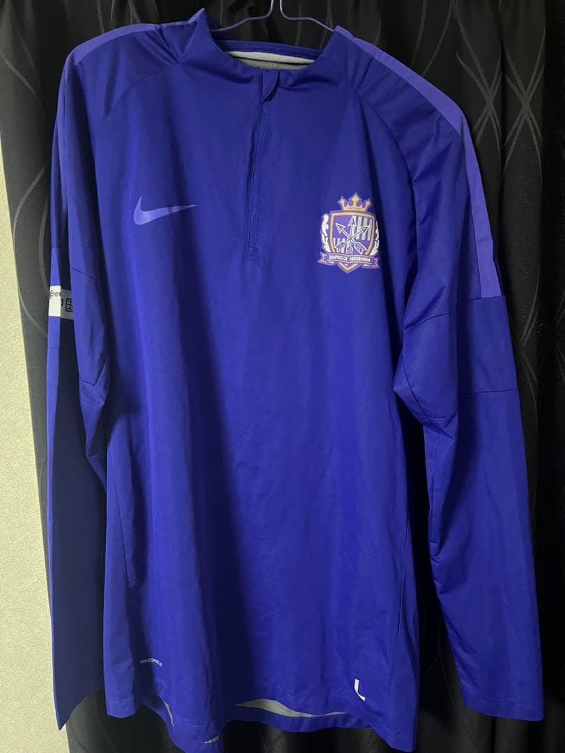 サンフレッチェ広島 Nike ハーフジップピステ 紫　サイズＬ